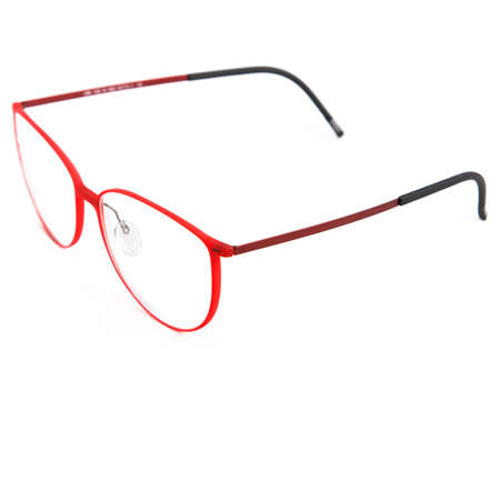 Red glasses frames on white background. Sun goggles and glasses for vision in red frames.の写真素材