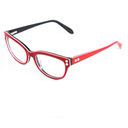 Red glasses frames on white background. Sun goggles and glasses for vision in red frames.の写真素材