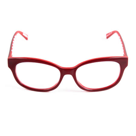 Red glasses frames on white background. Sun goggles and glasses for vision in red frames.の写真素材