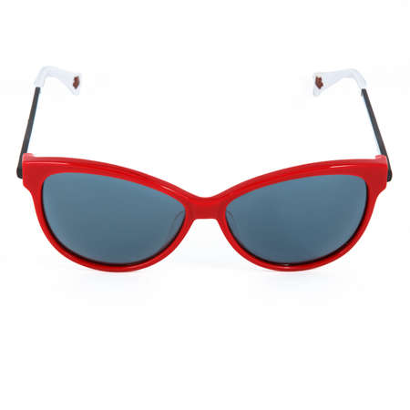 Red glasses frames on white background. Sun goggles and glasses for vision in red frames.の写真素材