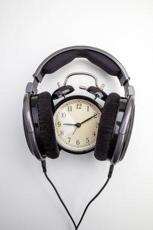 big headphones wrap around the alarm clockの写真素材
