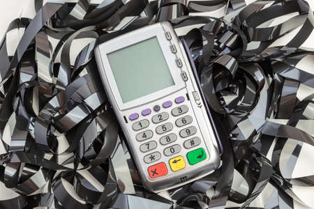 mobile bank terminal among magnetic tapeの写真素材