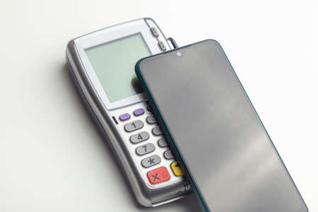 nfc mobile phone payment with mobile bank terminalの写真素材
