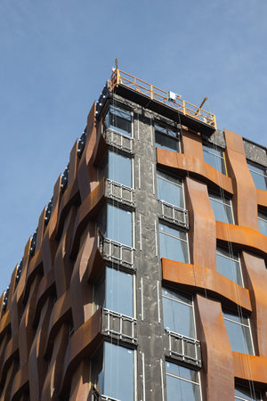 facade work on the installation of iron plates made of corten steelのeditorial素材
