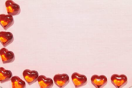 Glass hearts on a pink background. Valentines day. Place for text.