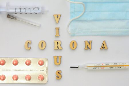 Word virus in wooden letters. Global healthcare concept pandemic virus infectionの写真素材