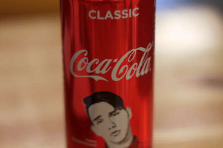 04.01.2020 Syktyvkar, Russia, red bottle of coca cola on blurred background. Stock photo for web and...
