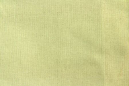 Green linen fabric cotton for wallpaper design. Brown weave cotton background texture.の写真素材