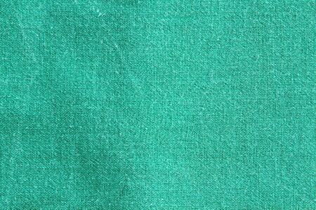 Green linen fabric cotton for wallpaper design. Brown weave cotton background texture.の写真素材