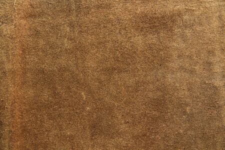 Brown genuine leather texture closeup. Background for text design.の写真素材