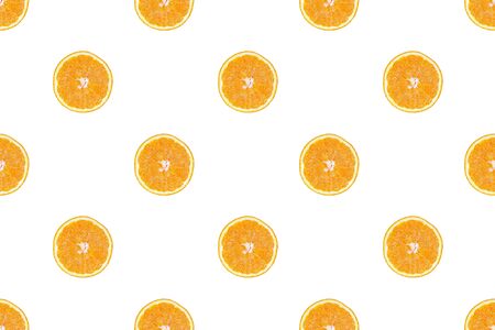 Seamless pattern of isolated slices of orange. Wallpaper for background, design and packaging.の写真素材