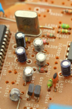 Microcircuit with radio parts close-up. Modern electronic industry.の写真素材
