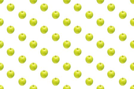 Pattern of green apples on a white background. Isolated fruits. Image for fabric, wallpaper and wrapping paper.の写真素材