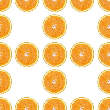 Seamless pattern of isolated slices of orange. Wallpaper for background, design and packaging.の写真素材
