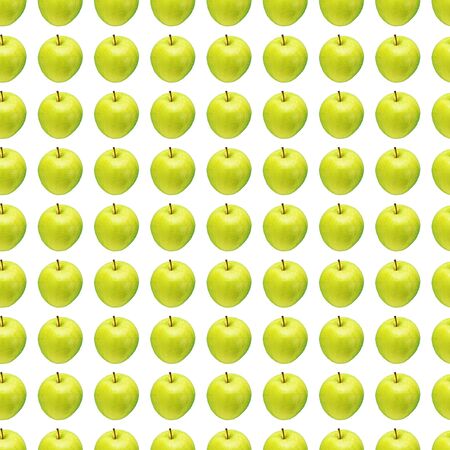 Pattern of green apples on a white background. Isolated fruits. Image for fabric, wallpaper and wrapping paper.の写真素材