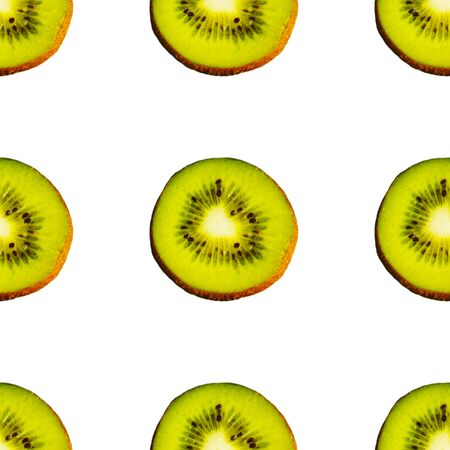Seamless endless pattern of juicy green slices of kiwi fruit isolated on white background. Design for wrapping paper, fabric and wallpaper.の写真素材