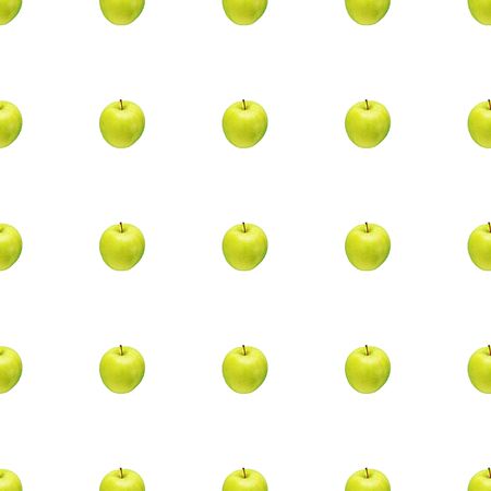 Pattern of green apples on a white background. Isolated fruits. Image for fabric, wallpaper and wrapping paper.の写真素材