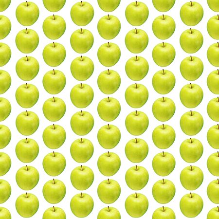 Pattern of green apples on a white background. Isolated fruits. Image for fabric, wallpaper and wrapping paper.の写真素材