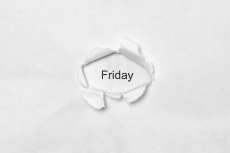 Word Friday on white isolated background, the inscription through the wound hole in paper. Concept of gender identity and sexual minorities. Stock photo for web and print with empty space for textの写真素材