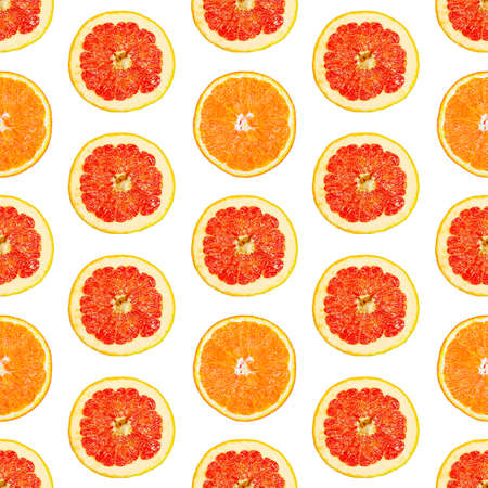 Seamless infinity pattern of isolated slices of grapefruit and orange. Stock illustartion for web and print, wallpaper, background, design and packaging, wrapping and scrapbooking paperの写真素材