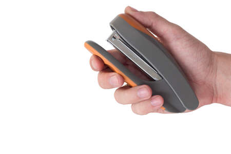 office stapler in hand isolated on white background