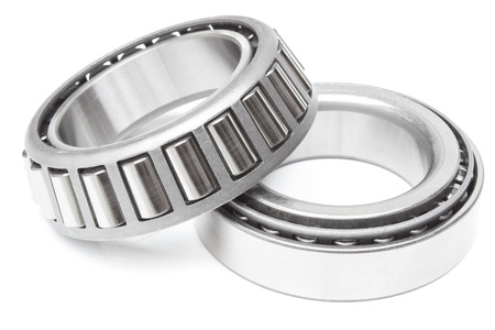 located on a white background variety of bearings and rollers wide range of applications, from automotive hub to engine belt tensionersの写真素材