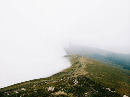 Foggy trail somewhere in the clouds. Carpathian mountains, Ukraineの写真素材