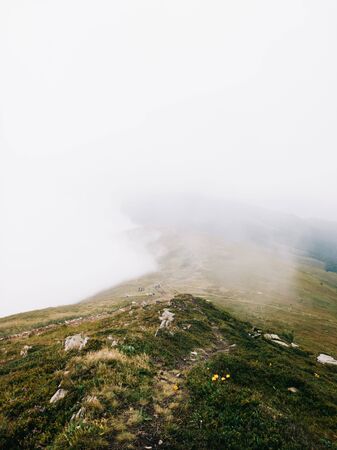 Foggy trail somewhere in the clouds. Carpathian mountains, Ukraineの写真素材