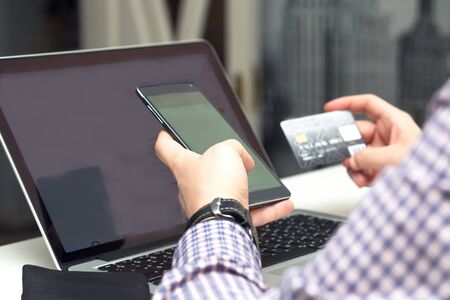 Online payment by card on the mobile phoneの写真素材