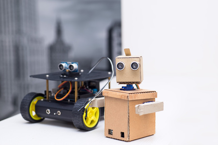 two robots are on the tableの写真素材