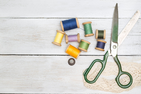 Vintage background with sewing tools and sewing kit.flat lay