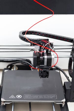 Modern 3D printing technology. Vertical photo