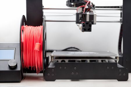 filament. 3d Printer with a plastic.