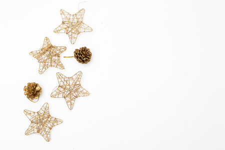 Christmas ornaments of gold color on a white background. Mockupの写真素材