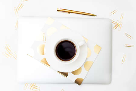 Coffee break. Feminine styling office desk