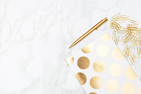 Stationery golden color on the table. Education conceptの写真素材