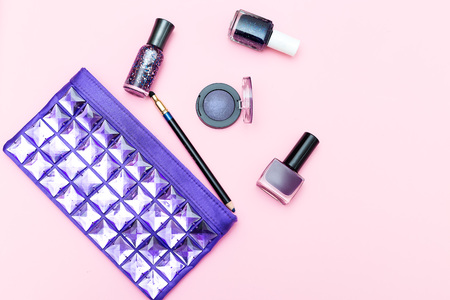 Beauty of ultraviolet color and cosmetics on a pink background. Flat layの写真素材