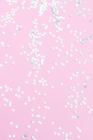 Pink background with sparkles. Vertical photo