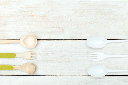 Wooden and bamboo kitchen appliances against plastic. Zero wasteの写真素材