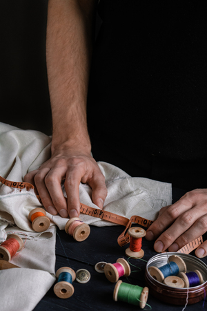 Male tailoring, sewing close up hands, craftsmanの写真素材