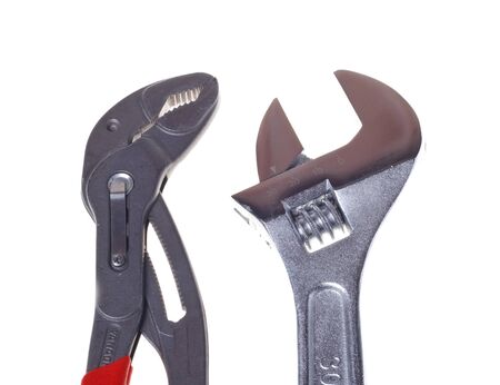 Alligator wrench and adjustable spanner on white background close-up (isolated).の写真素材