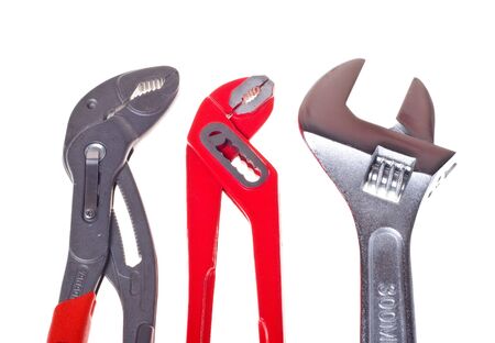 Alligator wrench and adjustable spanner on white background close-up (isolated).の写真素材