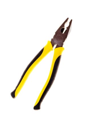 Pliers with dielectric handles on white background close-up (isolated).の写真素材