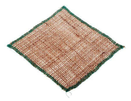 Tablecloth from burlap, isolated on a white background.の写真素材