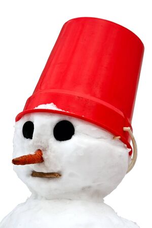 A snowman with a red pail on his head isolated on white background.の写真素材