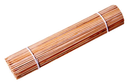 Wooden sticks for meat (skewer) isolated on a white background.の写真素材