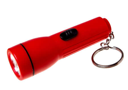 The red flashlight (keychain) isolated on a white background.の写真素材