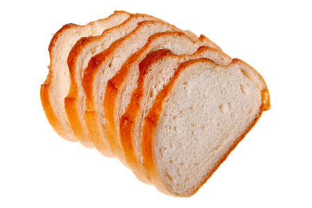 A loaf of bread sliced, isolated on a white backgroundの写真素材