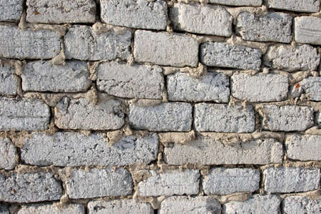 An old brick wall (background texture)の写真素材