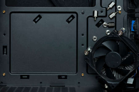Cpu cooler inside PC case- symbolizing computer service and repair.の写真素材